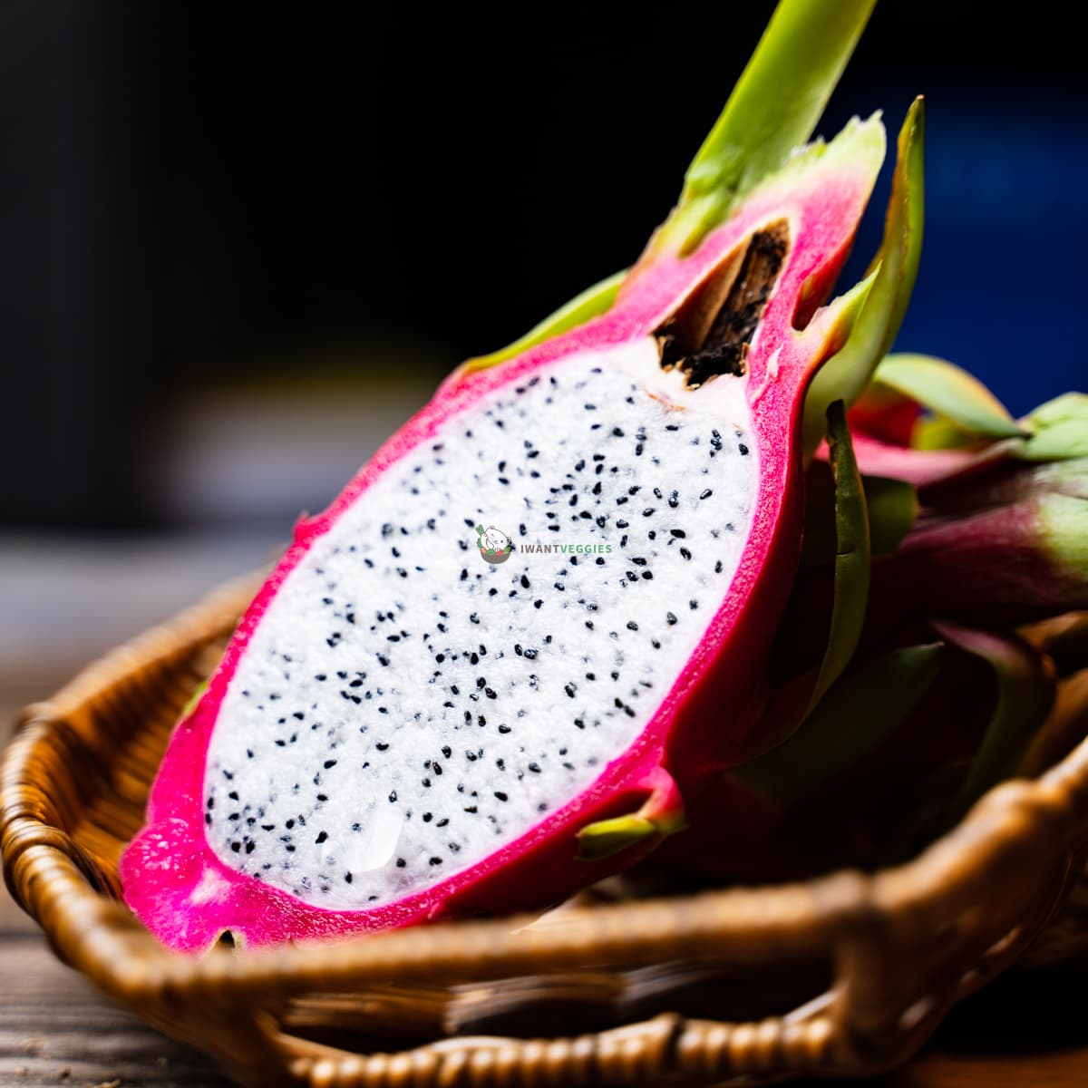 glistening white dragon fruit cut in half midsection