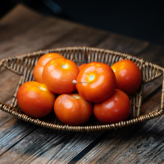 Fresh red tomatoes on wooden basket, healthy and ripe, ready to be eaten.